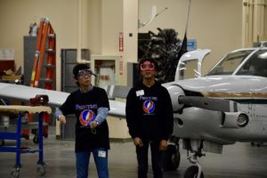 Students near airplane