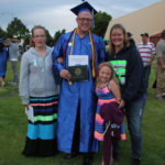 2014 graduate with family