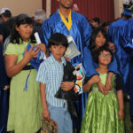 2014 graduate with family