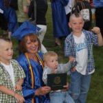 2014 graduate with family