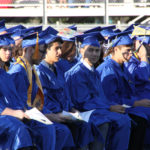 graduates sitting and waiting