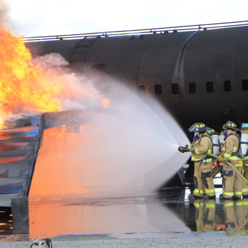 Firefighters doing live fire exercises