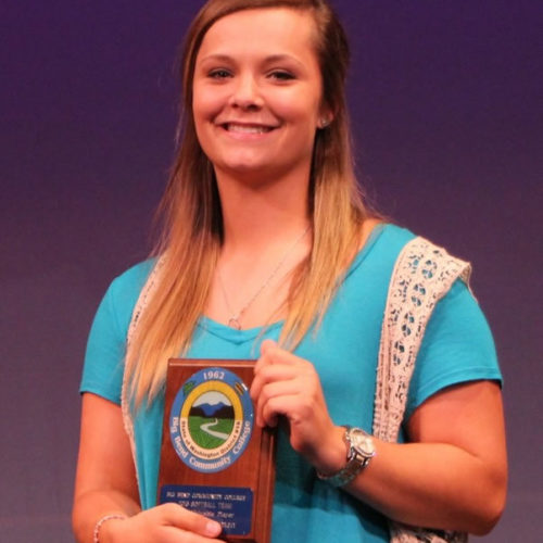 Student receiving award