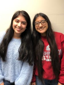 two girls with long black hair