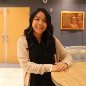 female student with long dark hair