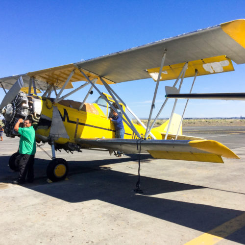 Student working on airplane