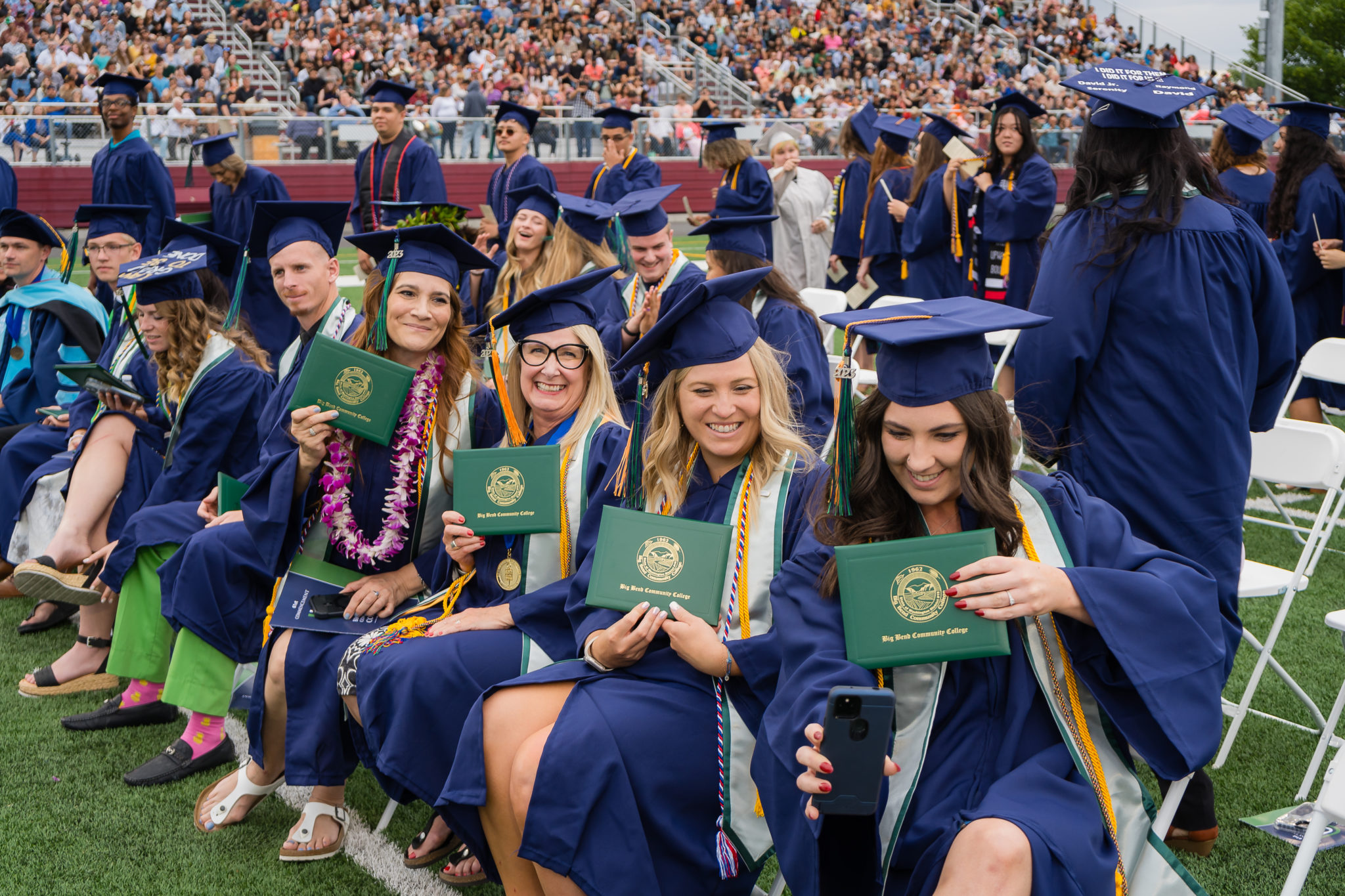 Members of the first cohort of Big Bend’s Bachelor of Applied Science in Applied Management degree program take a selfie after receiving their diplomas.