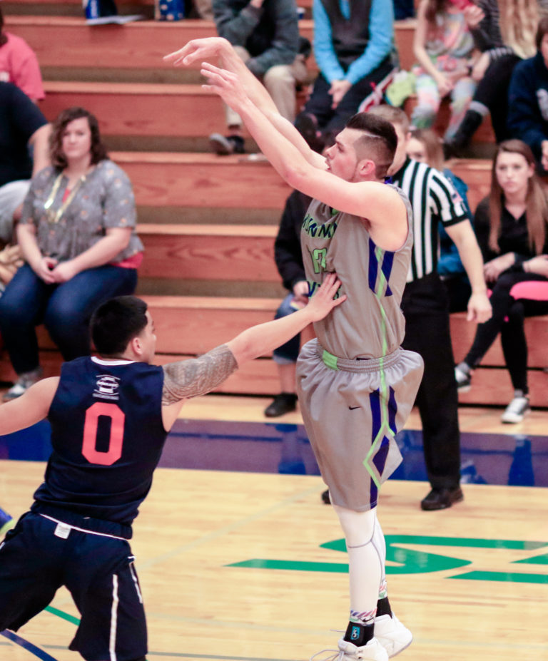 Basketball player shooting for the hoop