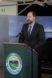 Man speaking at podium