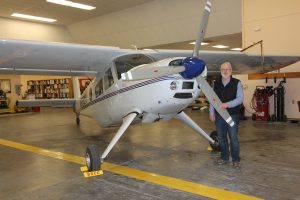 Erik Borg with Boeing plane donation with