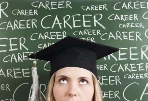 Student with a blackboard behind them with the repeated words "Career" written