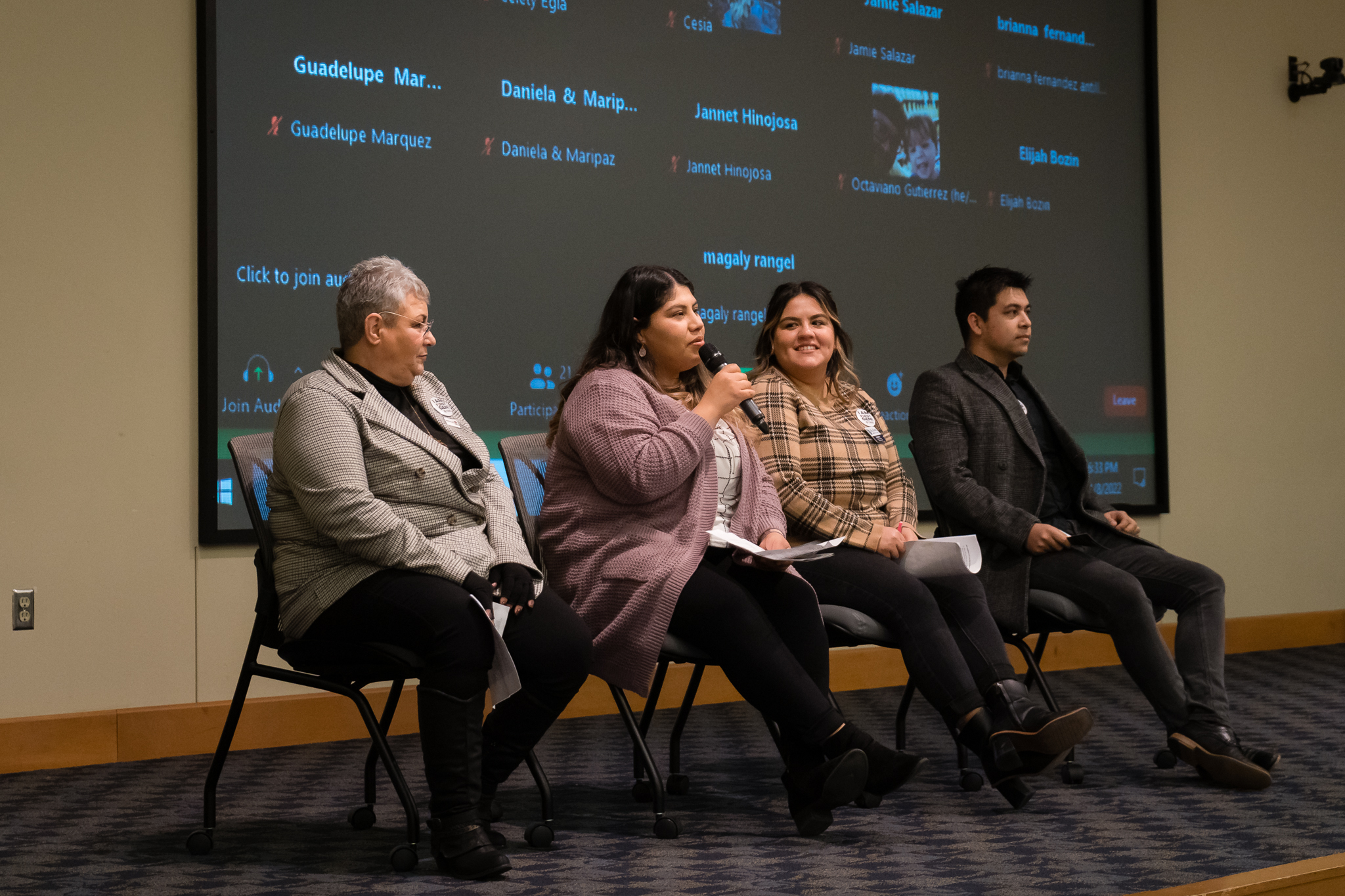 students speaking on stage