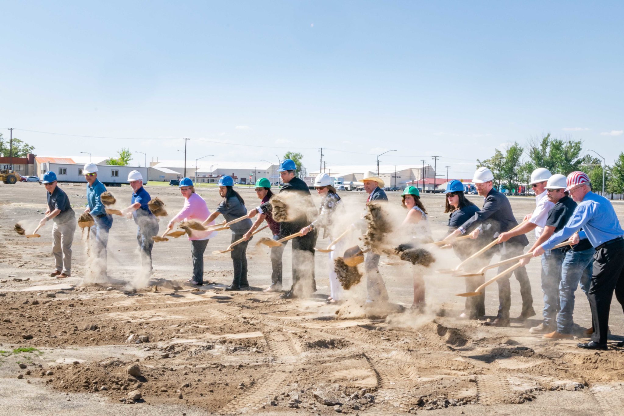 Faculty of BBCC shoveling dirt