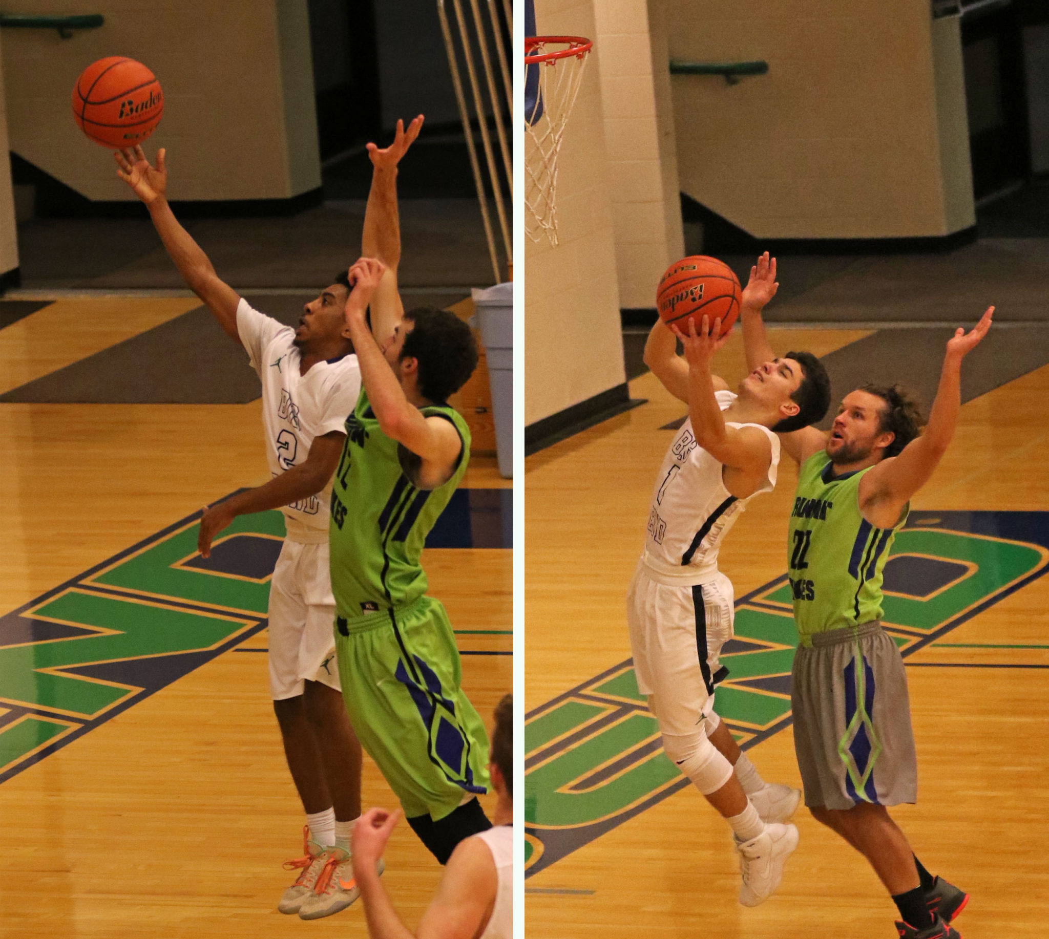 Two basketball players throwing a basketball