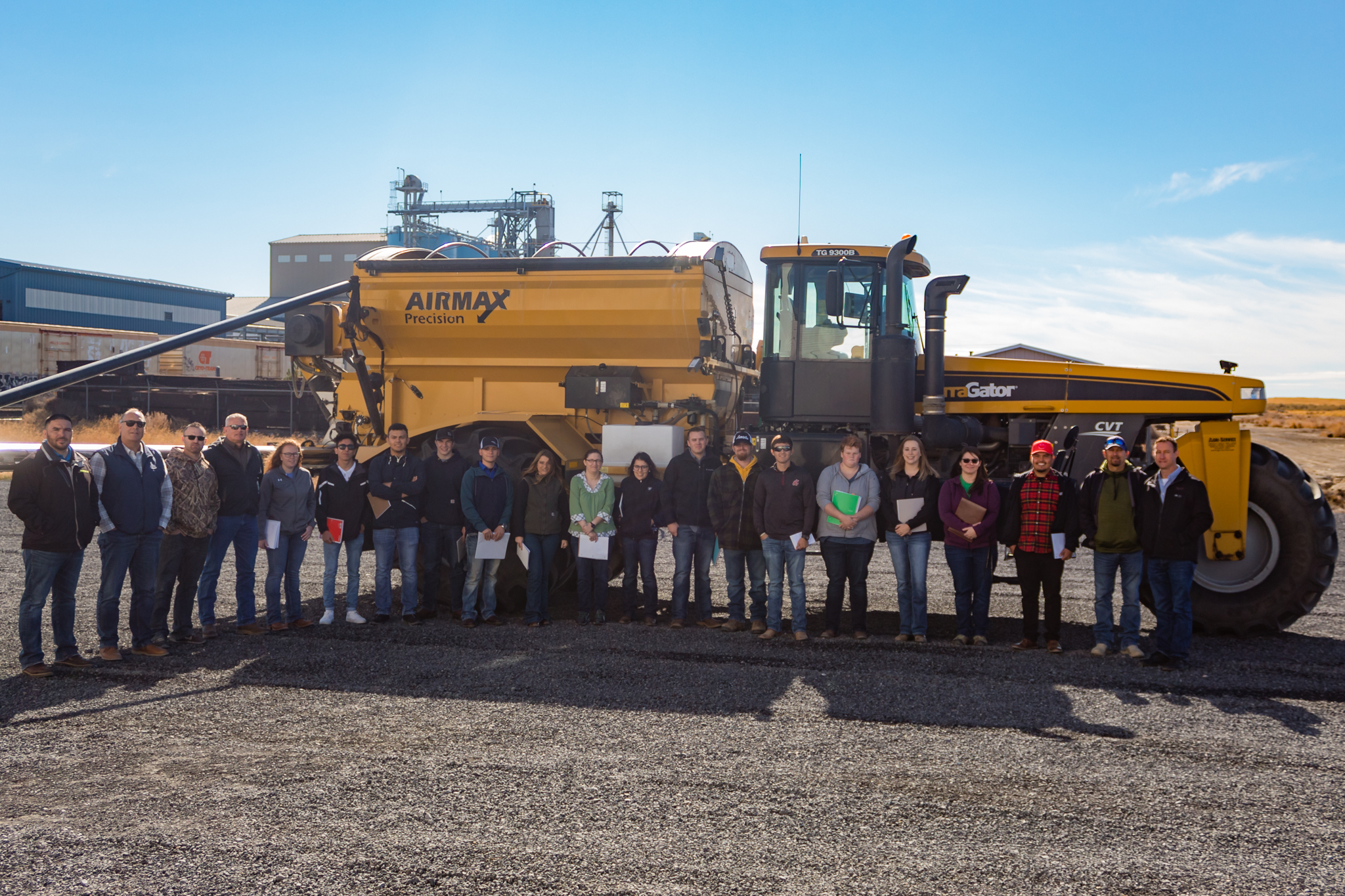 agriculture program students in front of a large farm truck