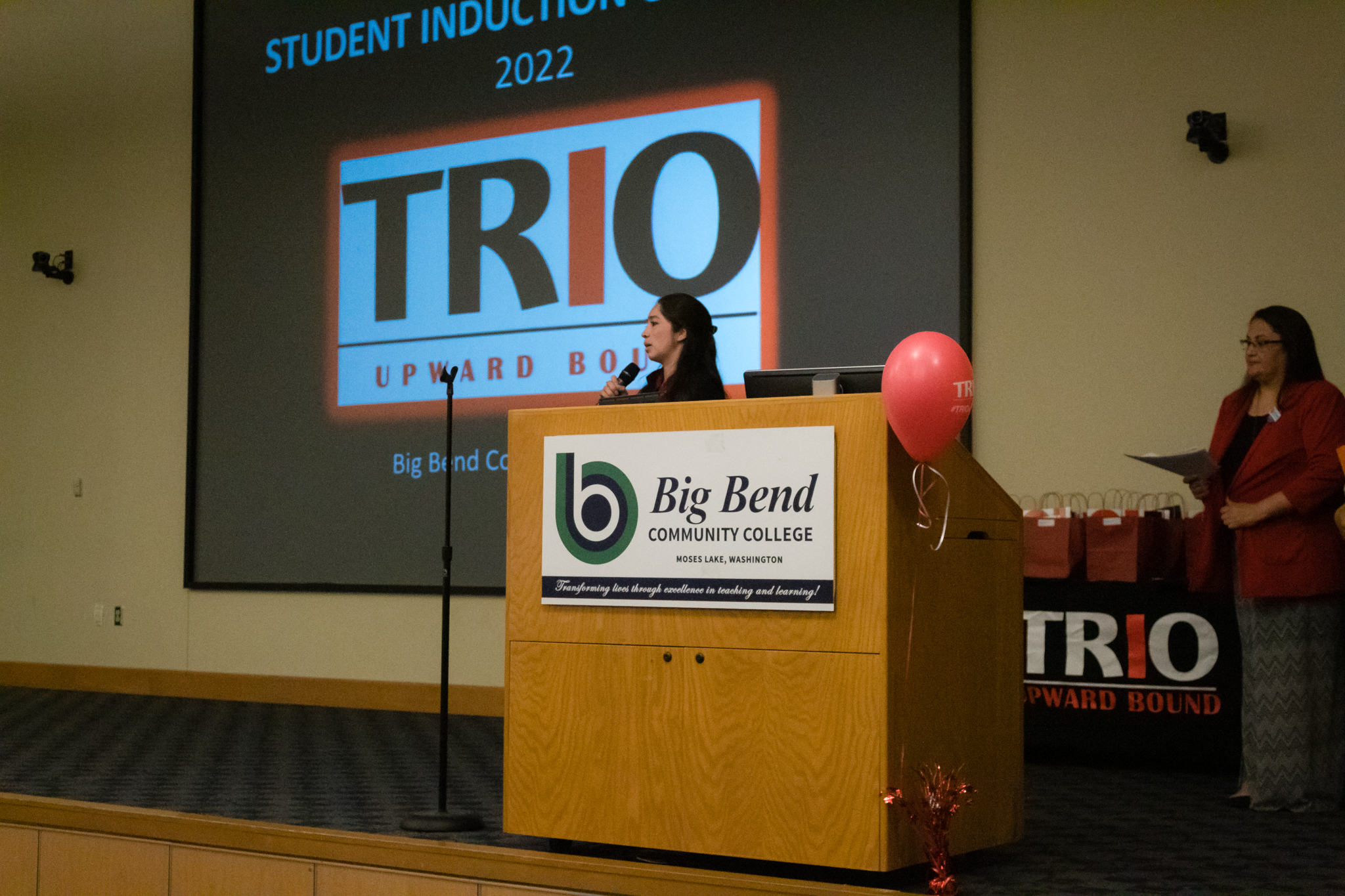 Veronica Guadarrama talks to students and parents during the trio induction