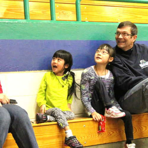 From left, Jewel, Ruby, Elizabeth, and Clay Floch attending a Ryan Floch Memorial Game in 2013 shortly after returning from China