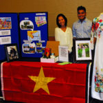 students at display of Vietnam at multicultural fair