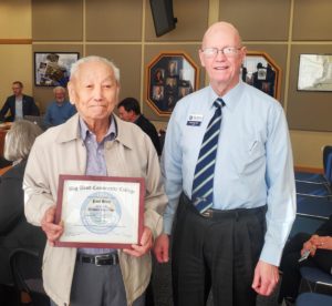 Two men award presentation