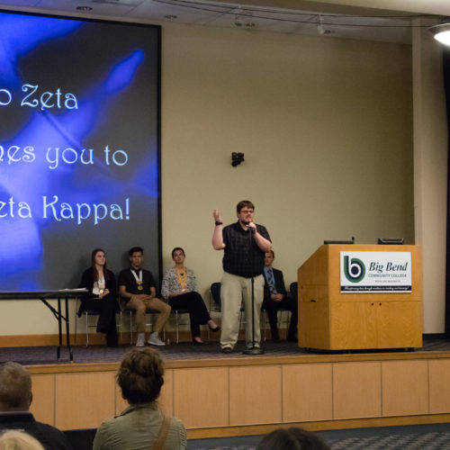 Students being inducted to Phi Theta Kappa