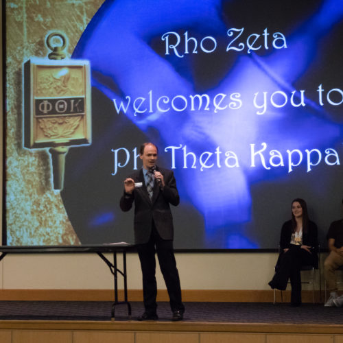 Students being inducted to Phi Theta Kappa