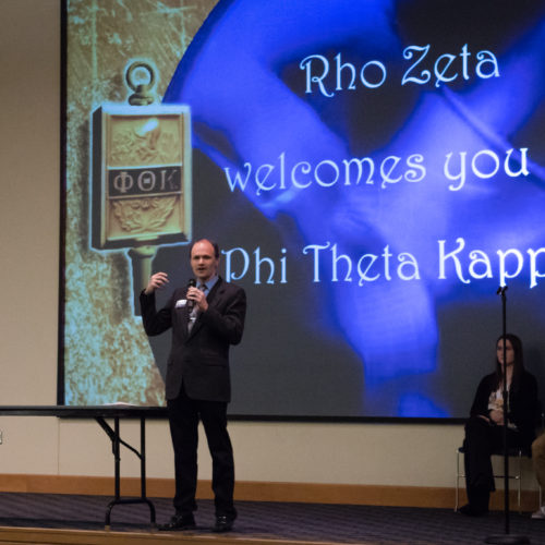 Students being inducted to Phi Theta Kappa