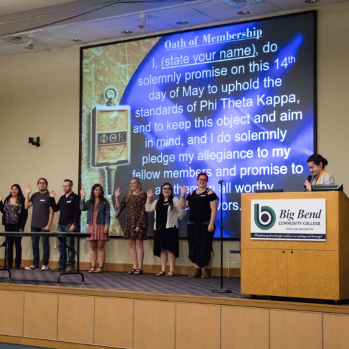 Students being inducted to Phi Theta Kappa