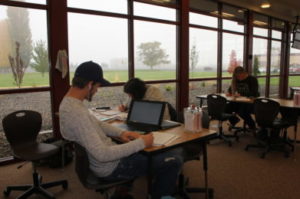 Student at computer in STEM Center