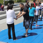 audience participates in self defense practices