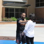 audience participates in self defense practices