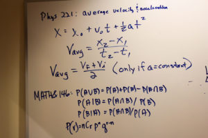 Math equation on white board