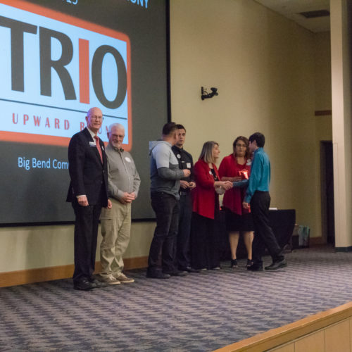 Students being congratulated TRIO member induction