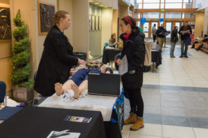 Student talking to instructor