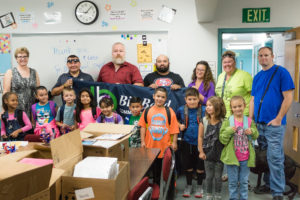 Vet Corp reps with elementary students