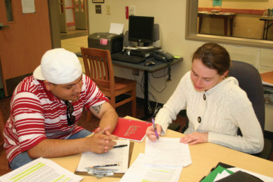 tutor with student in writing center