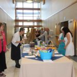 guests checking out the auction items