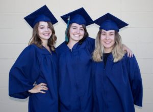 three girls at graduation 