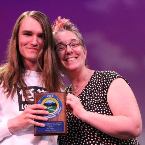 Teacher and student at outstanding student recognition event