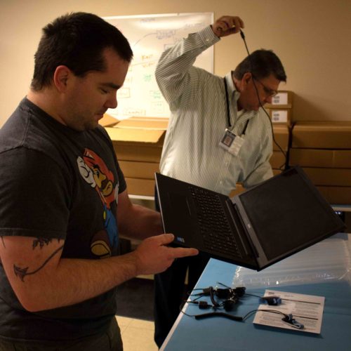 Student holding laptop