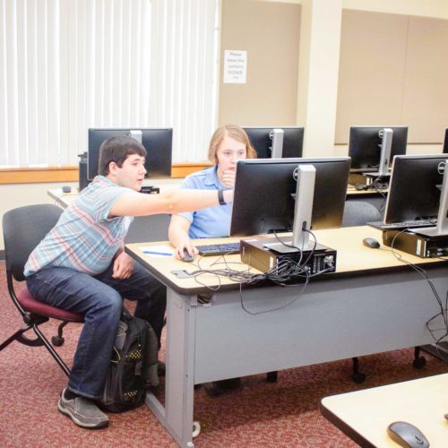 Students programming at challenge event