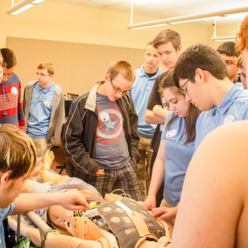 Students programming at challenge event