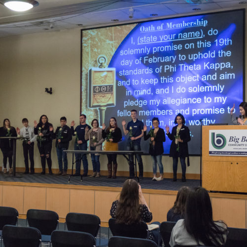 Students being inducted to Phi Theta Kappa.