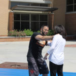 audience participates in self defense practices